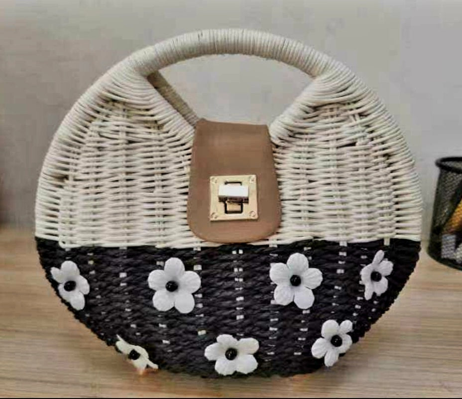 Quaint, elegant, one of a kind handcrafted straw bag.
