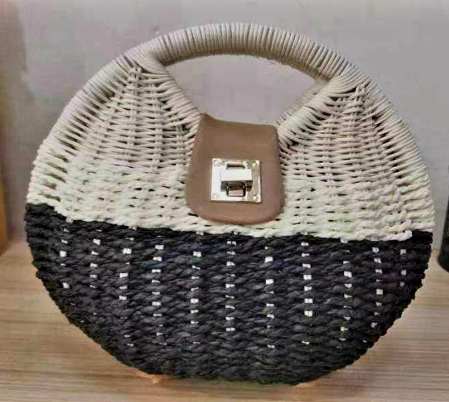 Quaint, elegant, one of a kind handcrafted straw bag.