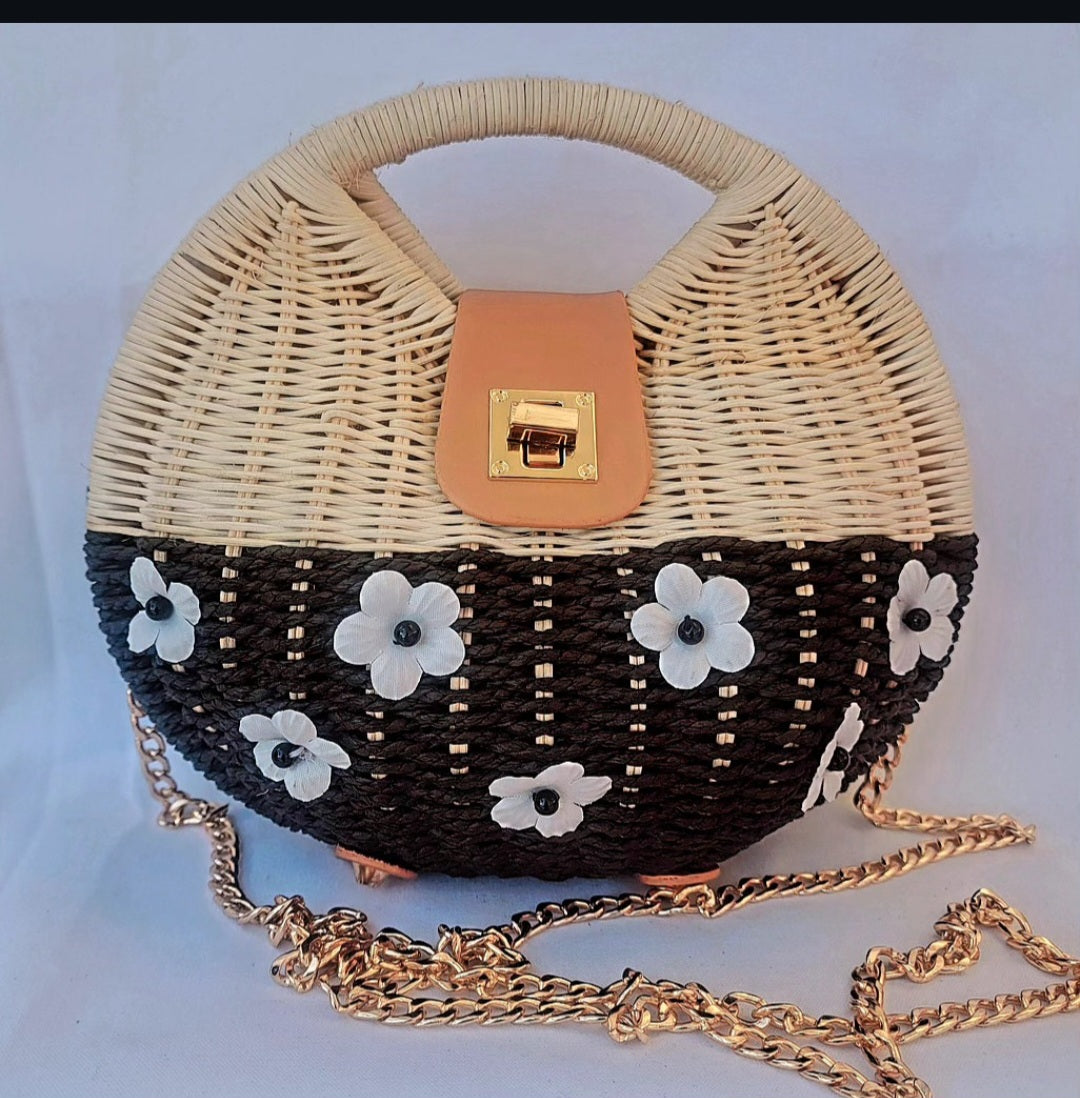 Charming handcrafted black and white straw handbag
