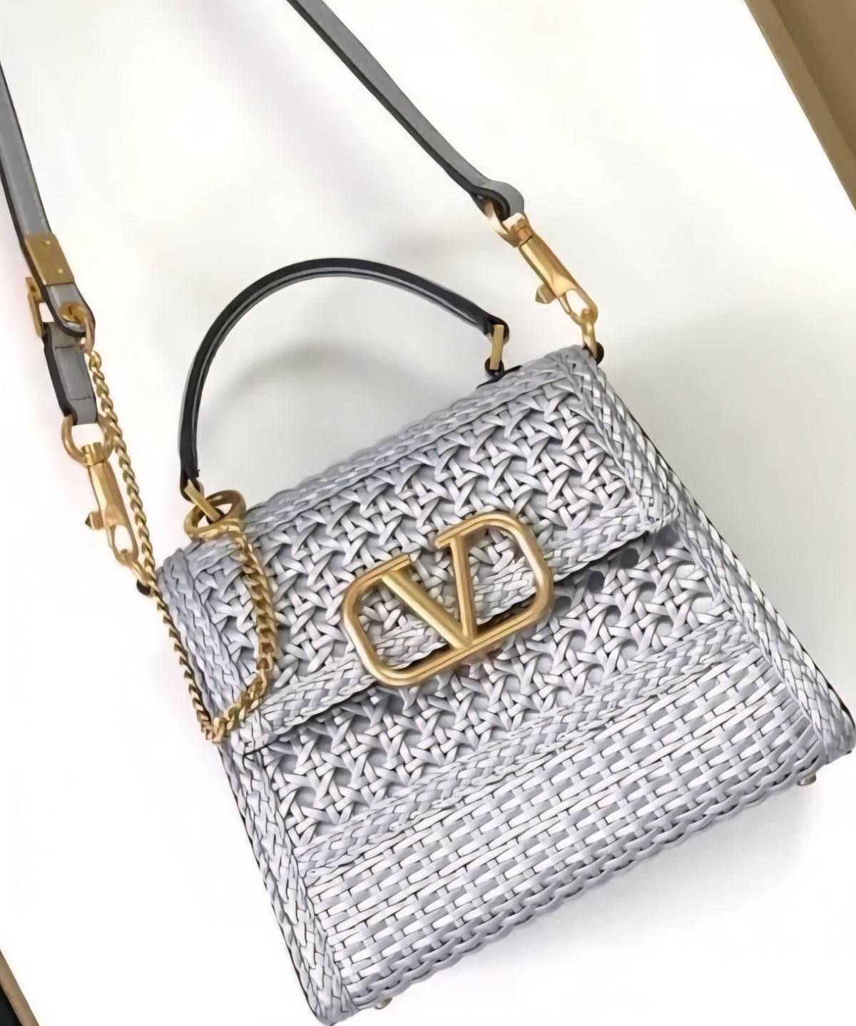 Small silver woven handbag