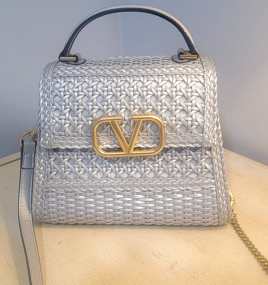 Small silver woven handbag